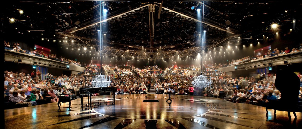 A wide-lens shot of the theatre from the stage