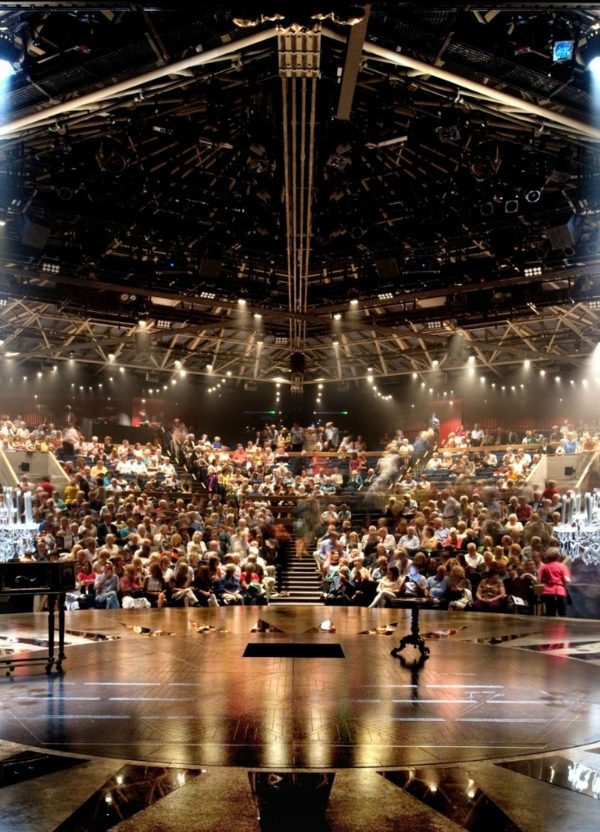 A wide-lens shot of the theatre from the stage