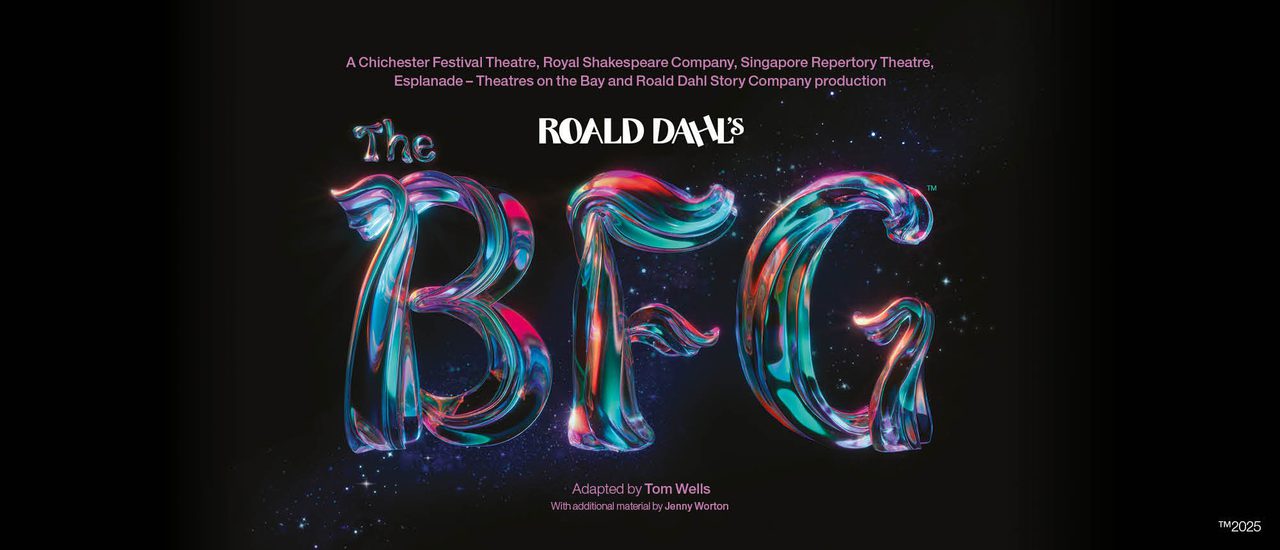 Against a black background, text reads 'Roald Dahl's The BFG'. 'Roald Dahl' is in white, with 'The BFG' in a magical, shimmering type with pink, purple, orange and teal glowing and blending throughout. The texture of the text is like a tree trunk or branch.