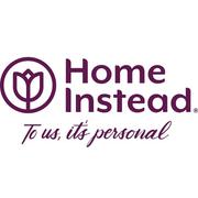 Home Instead text logo in purple text. A stylised icon of a rose is to the left of the lettering, with 'To us, it's personal' in handwritten style underneath.