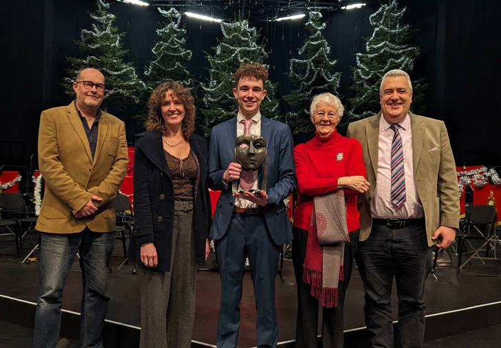 Henry Reeder on the Festival Theatre stage with his family