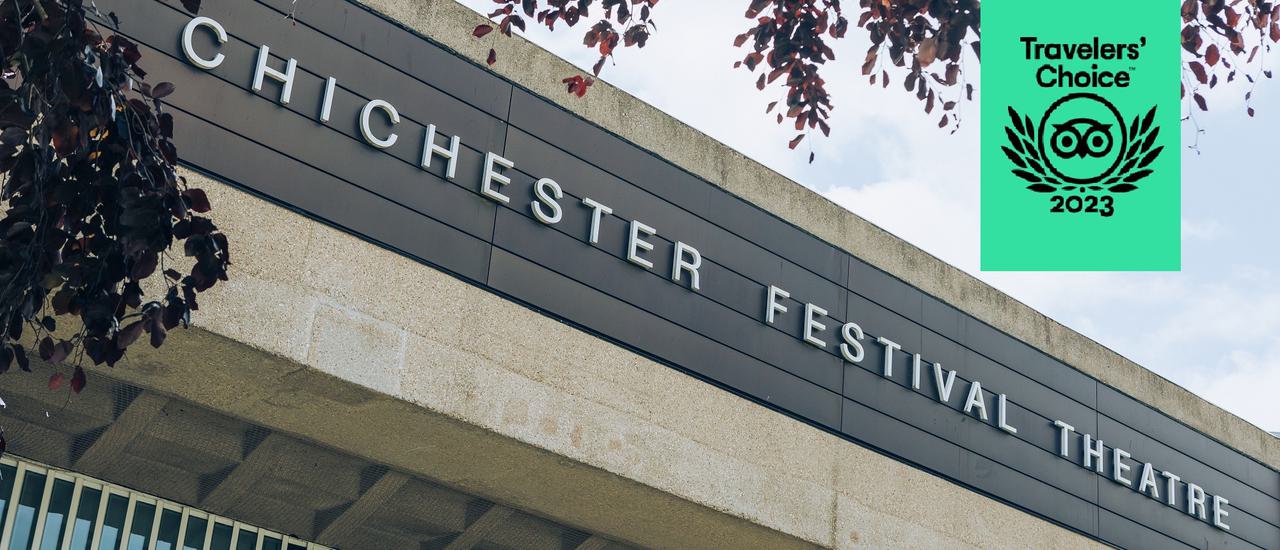 Photo of Chichester Festival Theatre building  at an angle and a TripAdvisor Travelers' Choice award logo place top right.