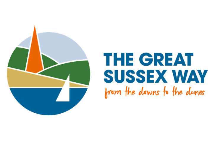 stylised graphic showing the sea, boats, hills and the spire of Chichester Cathedral with the wording The Great Sussex Way from the downs to the dunes
