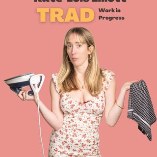 A woman with long blonde hair in a floral dress holds an iron in one hand and a black and white tea towel in the other. She looks at the camera with a disheartened expressions. The text reads @Kate-Lois Elliot, Trad, Work in Progress'.