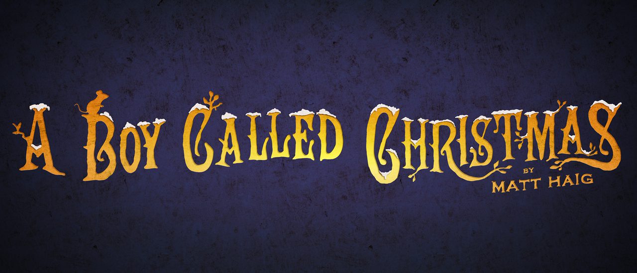 The title 'A Boy Called Christmas' is written in elaborate, old-fashioned capital letters in gold text against a dark purple background. Some of the letters sprout leaves or are adorned with snow, and a mouse sits on top of the B of Boy.