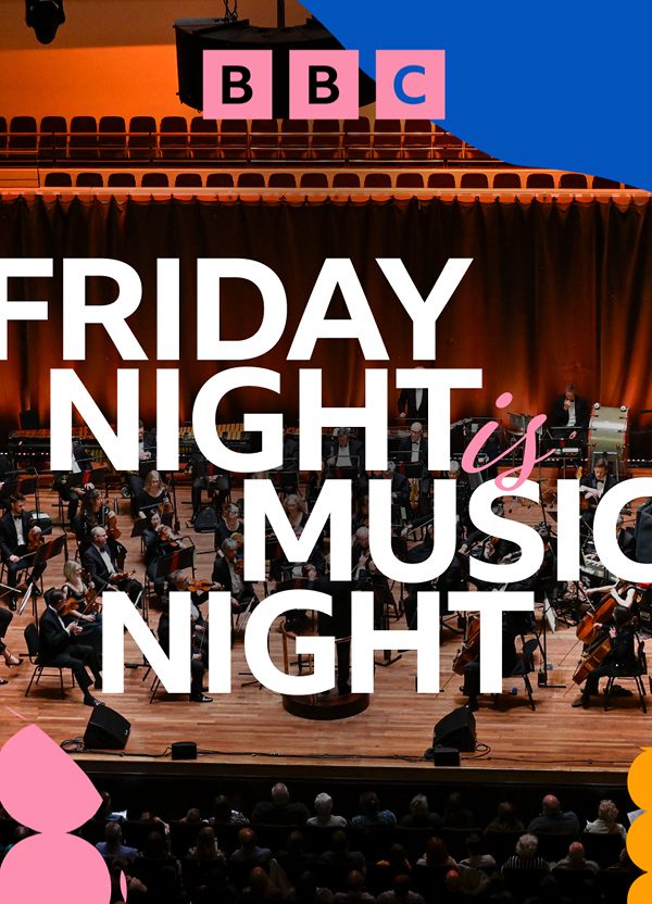 The BBC Concert Orchestra sit performing on a stage with a red curtain in the background. Text on top of the image reads: 'BBC Friday Night Is Music Night' with yellow, pink and blue graphics in the corners.