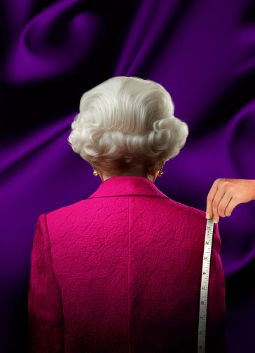 An imitation of Queen Elizabeth II from behind: an older woman with nearly styled, short, grey, wavy hair, pearl earrings and a pink blazer. The background is a rich purple silk.