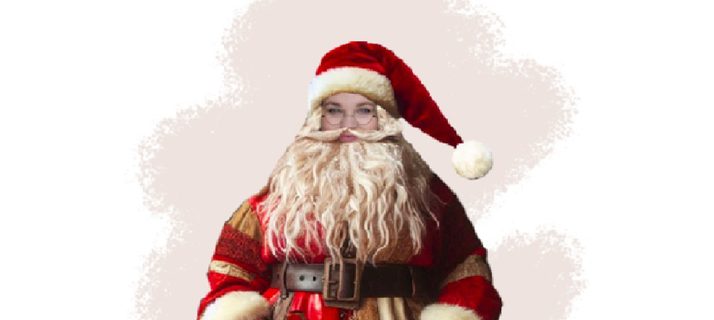 A illustration of a Father Christmas in a patchwork costume - red and cream jacket and hat, big black belt and boots and a very white beard.