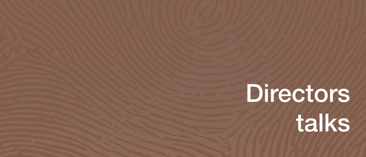 A brown background with a finger print-like pattern, white text reads Directors Talks.