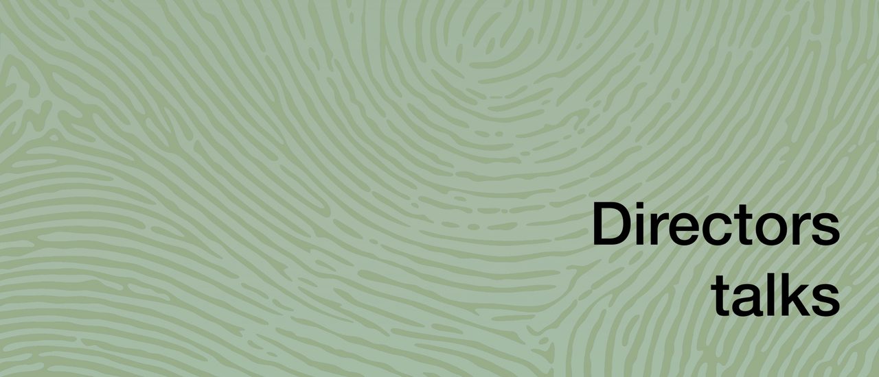 A green background with a finger print-like pattern, black text reads Directors Talks.
