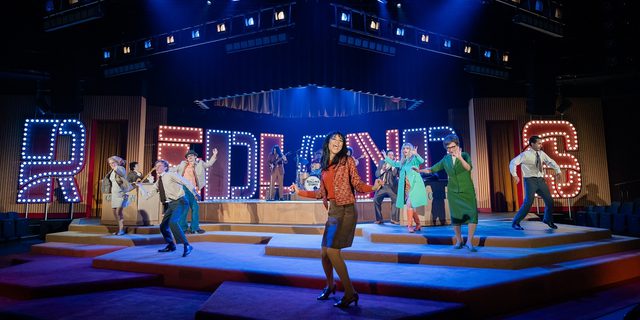 'Redlands' is spelled out in illuminated capital letters.