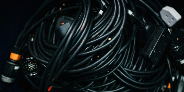 A coiled pile of electrical cables