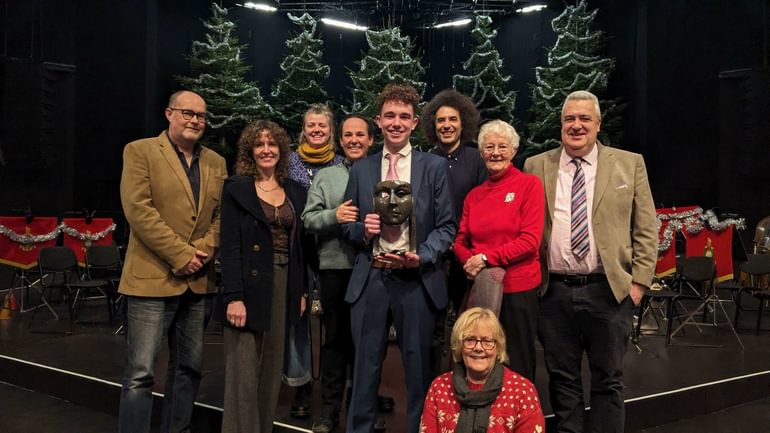 Henry Reeder and members of his family and the CFT team on the Festival Theatre stage