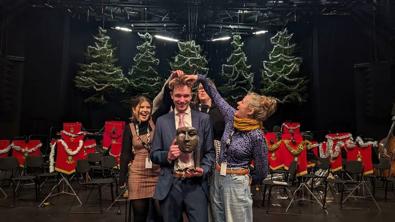 Henry Reeder and some of CFT's wardrobe team on the Festival Theatre stage