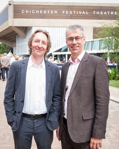 Jonathan Church on the left, and Alan Finch on the right, stand with Chichester Festival Theatre behind then.
