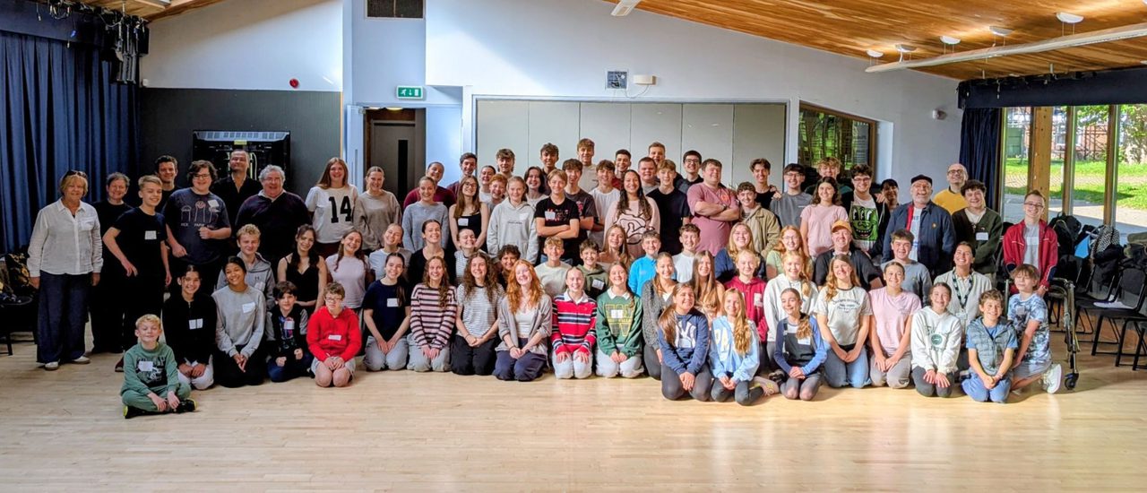 The cast of A Boy Called Christmas pose for a photo in the Steven Pimlott Building.