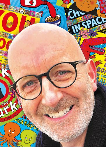 Nick Sharratt, a bald man with black, round glasses, smiles warmly with a collage of brightly coloured illustrated picture book covers in the background.